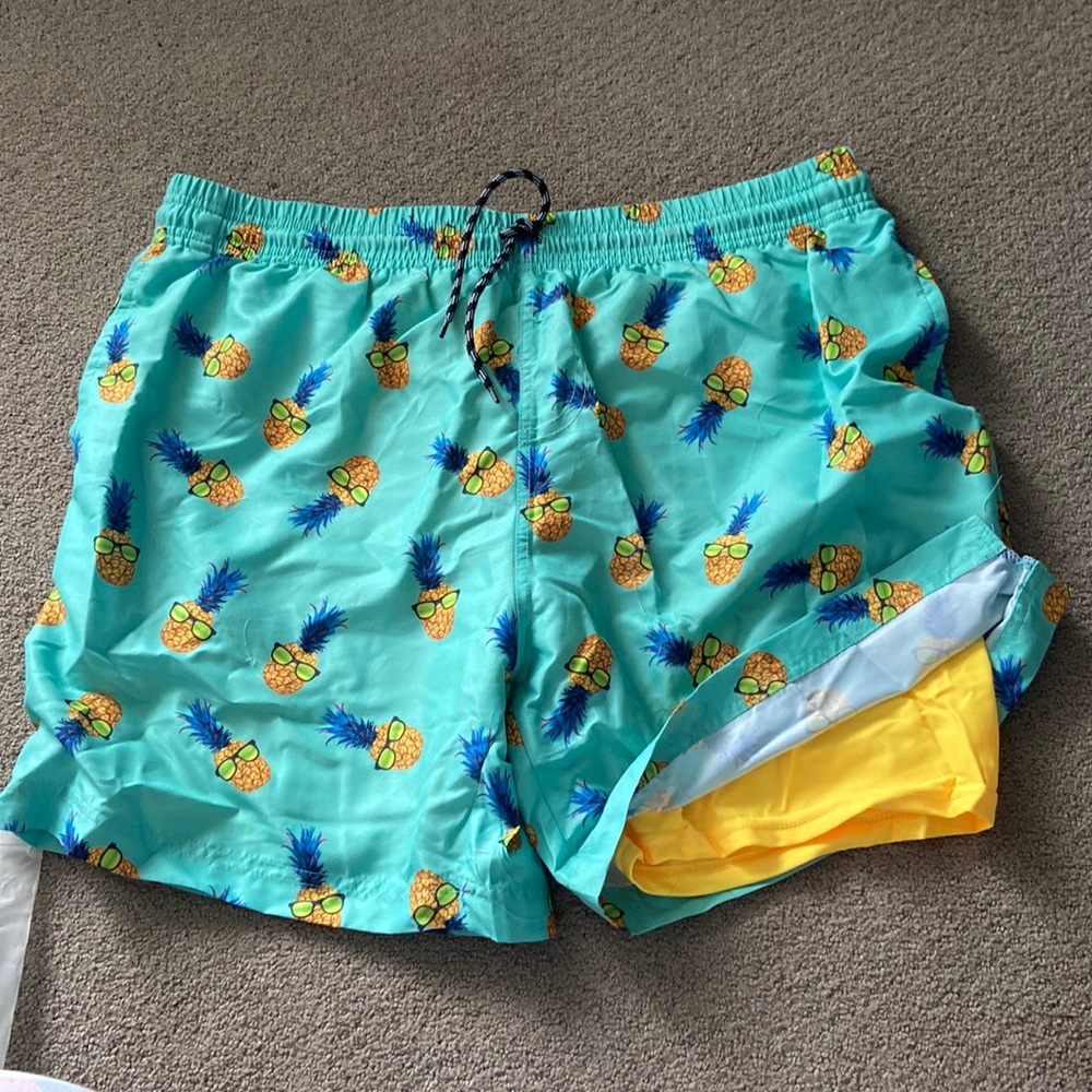 Pineapple board shorts with yellow short liner